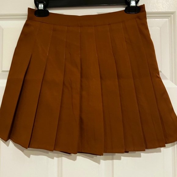 Dresses & Skirts - Brown pleated skirt with undershorts NWOT